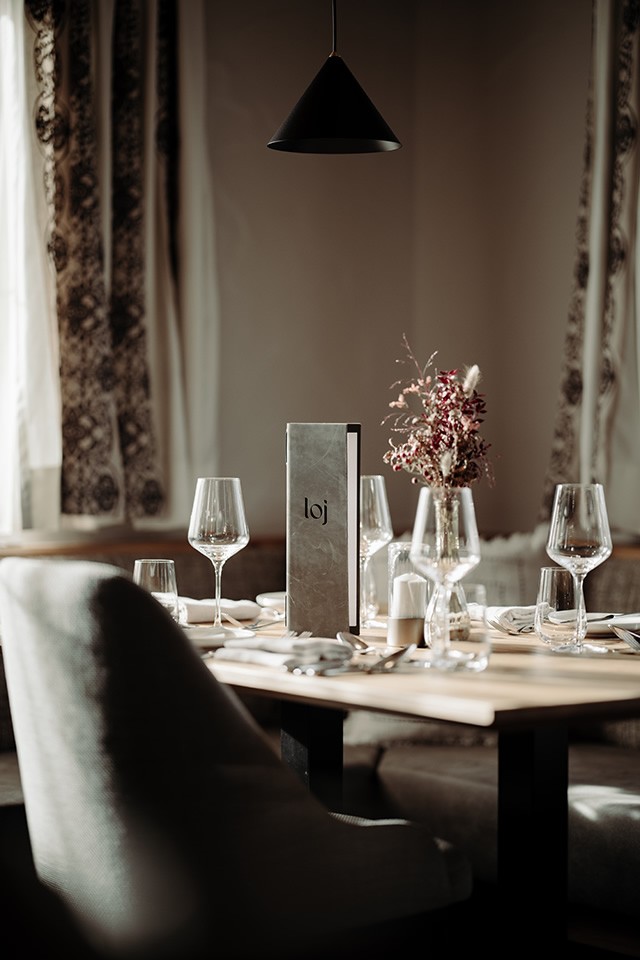Beautiful setted table in the Restaurant seven's kitchen in Flachau