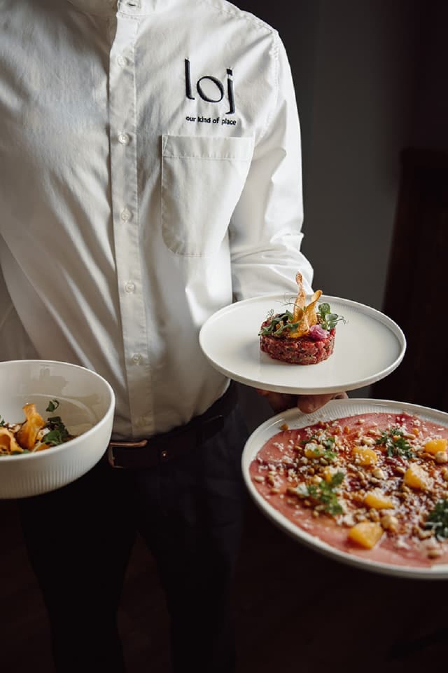 Serving the dishes in the Restaurant seven's kitchen in Flachau