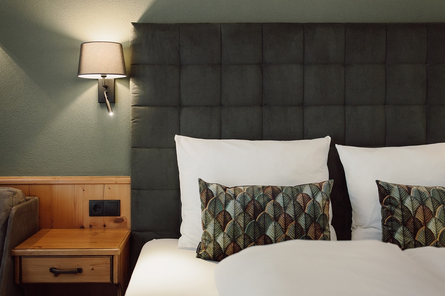 Cozy hotel room with double bed at Hotel loj in Flachau